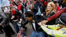 Police and protesters face off during a May Day march in London last month. The abundance of veto points makes sustained strategic continuity substantially harder to achieve in countries like Britain. AFP