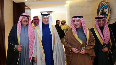 Kuwaiti Foreign Minister Ahmed Nasser Al Mohamed walking alongside Oil Minister Khaled Al Fadhel and Saudi Oil Minister Prince Abdulaziz bin Salmanat the Kuwaiti Foreign Ministry headquarters in Kuwait City. AFP