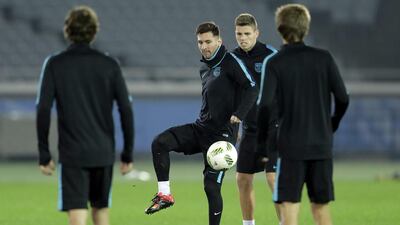 Barcelona’s Lionel Messi plas the ball during training on Wednesday in Japan. Kiyoshi Ota / EPA