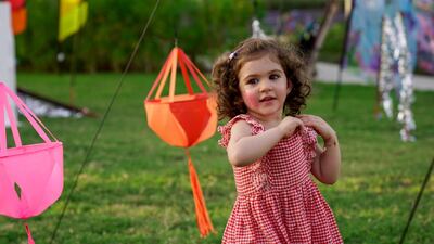 A little girl enjoys the festival.