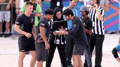 Sheikh Hamdan bin Mohammed talks strategy with his team.