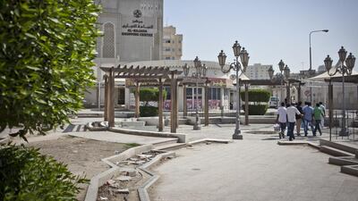 29/03/2014 DOHA, QATARA The Al-Najada Shopping center, near the Msheirab Neighbourhood construction site. Planned to cover 31 hectares when finished, the project includes high-end residences and shopping, cultural centres and government buildings. It is but one of many ambitious developments that Qatar hopes to complete by the time it hosts the football World Cup in 2022.