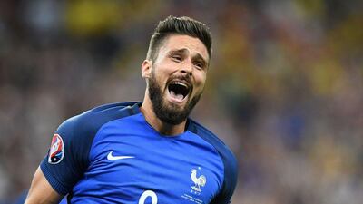 France forward Olivier Giroud celebrates after scoring the 1-0 during the Euro 2016 group A football match between France and Romania at Stade de France, in Saint-Denis, north of Paris, on June 10, 2016. Franck Fife / AFP