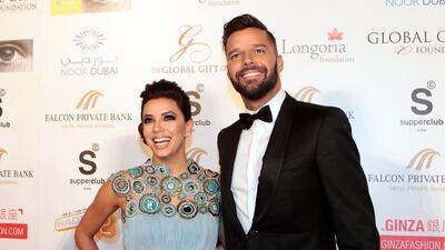 Actress Eva Longoria with pop-star Ricky Martin at the red carpet of the 2014 Global Gift gala. ( jeffrey E Biteng / The National )