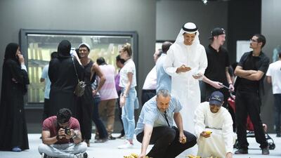 Visitors enjoy Gu Dexin's installation at Abu Dhabi Art. Courtesy TCA Abu Dhabi