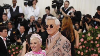 While costume designer Catherine Martin wore sequins and hot pink feathers, it was the Australian director Baz Luhrmann, in his double breasted, embellished, tan suit that nailed the theme. EPA