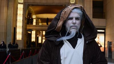 Matthew Payne of Glendale, California awaits the premiere of Star Wars: The Force Awakens at the TCL Theatre in Hollywood, California. Paul Buck / EPA