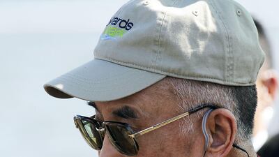 July 16, 2011: Tibetan spiritual leader the Dalai Lama leaves after blessing the Anacostia River in Washington with sand from a mandala mixed with water during a ceremony marking the end of the annual Kalachakra. AFP Photo / Jewel SAMAD