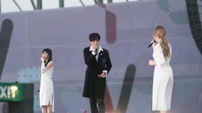 Red Velvet's Wendy and Seulgi perform with Kangta during the concert at the Autism rocks Arena. Reem Mohammed / The National