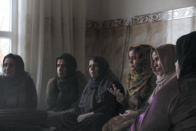 Women from the village of Gomasheen listen to Mrs Kurdistan Rasul talk about the dangers of female genital mutilation, a practice still common in Iraqi Kurdistan. Florian Neuhof for The National