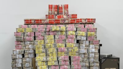Iraqi and American currency worth $20 million was seized in the latest corruption raids. Photo: Iraq News Agency