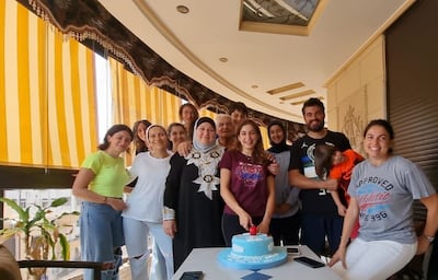 Grace Dergham with her family during her farewell gathering in Beirut. The architect says the decision to pack up and leave came with an immense feeling of guilt that 'eats at her every day'