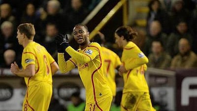 Raheem Sterling celebrates the opening goal during the English Premier League match against Burnley at the Turf Moor stadium in Burnley, Britain, 26 December 2014. EPA/PETER POWELL