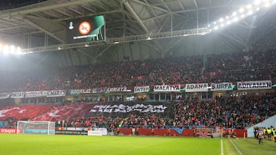Trabzonspor fans inside the stadium display banners as a tribute to the earthquake victims. Reuters
