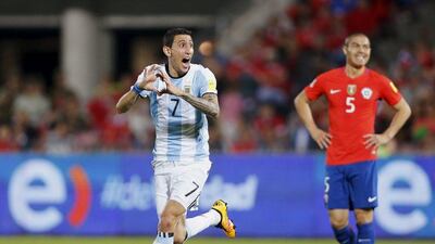Angel di Maria, left, of Argentina celebrates after scoring against Chile. REUTERS/Rodrigo Garrido