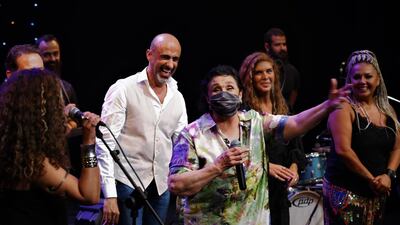 Lebanese artists greet the audience and sing during the reopening of the 'City Theatre' in Al Deena Theatre, Beirut, after being closed down beause of the coronavirus pandemic. EPA