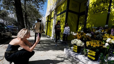 Flowers are left in memory of Virgil Abloh, Louis Vuitton's first Black artistic director, at a church in Miami, Florida's design district. AP