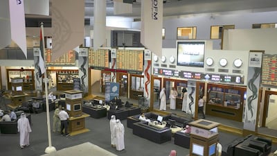 Anxious traders at the floor of Dubai Financial Market on Wednesday, December 17. Reem Mohammed / The National