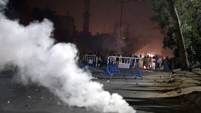 Police fire tear-gas canisters to disperse supporters of Islamic political party Tehrik Labaik Ya RasoolAllah (TLP) during a protest over the Khadim Hussain Rizvi arrest in Karachi. Tehreek-e-Labbaik Pakistan (TLP) chief Khadim Hussain Rizvi has been taken into protective custody by the police. EPA