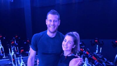 'Game of Thrones' and 'The Umbrella Academy' star Tom Hopper was seen working out at spin studio, Crank, on February 28. Photographed here with instructor, Holly Drake. Courtesy Crank