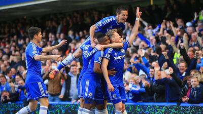 Arsene Wenger's 1,000th match for Arsenal went Chelsea's way as Andre Schurrle celebrates the Blues' second goal with teammates Cesar Azpilicueta, Samuel Eto'o, Oscar, Cesar Azpilicueta at Stamford Bridge on March 22, 2014 in London. Richard Heathcote / Getty Images
