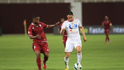 Al Jazira's Ricardo de Oliveira searches for a way through the Al Wahda defence at Al Nahyan Stadium. Ravindranath K / The National