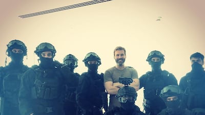 Vikings actor Clive Standen poses with the Abu Dhabi SWAT team after filming scenes for new TV show Mirage in Abu Dhabi. Clive Standen / Instagram