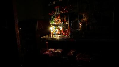 Sweets for sale are seen inside a store lit by candlelight as the neighbourhood Parque Batlle goes without electricity, although power has mostly been restored after a massive blackout in Argentina cut electricity to much of neighbouring Uruguay and swaths of Paraguay, in Montevideo, Uruguay. Reuters