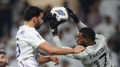 Khalid Essa, right, is the goalkeeper and captain of Al Ain. EPA