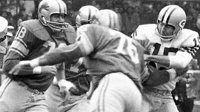 Back in 1962, Darris McCord (78), Roger Brown (76) and the rest of the Lions' defence made things rough for Bart Starr, right, and the Green Bay Packers on Thanksgiving Day. The present-day Lions hope history repeats itself.