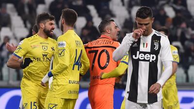 Chievo goalkeeper Stefano Sorrentino celebrates his penalty save against Cristiano Ronaldo. The save could not prevent Juventus winning the game 3-0. Getty