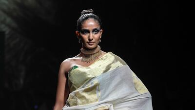 Designer Usha Devi Balakrishna presented rows of elegant saris. EPA