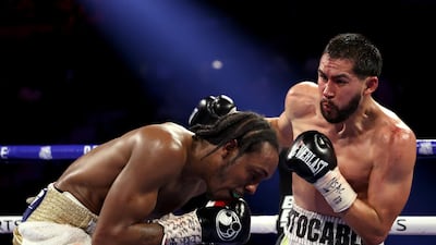Javier Molina (R) punches Amir Imam during their super lightweight bout at MGM Grand Garden Arena in Las Vegas. AFP