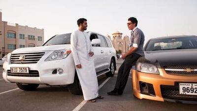The university students Aref al Mazrooei, 21, left, and Ahmed al Saadi, 20, like to speed.