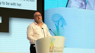 Jonathan Cooper, director of Worldwide Insurance Solutions, speaks at the Dubai International Health Tourism Forum. Reem Mohammed / The National