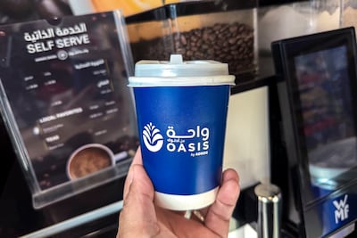 Those with Adnoc Rewards can use points at convenience stores and free coffee. Victor Besa / The National