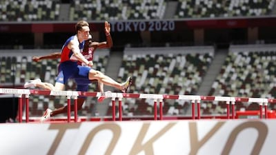 Karsten Warholm of Norway competes in the men's 400-meter hurdles final.
