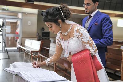 Anand Pious and Anu Francis had a small church wedding. Photo: Arun Pious
