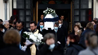 Pallbearers carry the coffin of one of the victims of the train crash, during a funeral procession, in Thessaloniki. AP