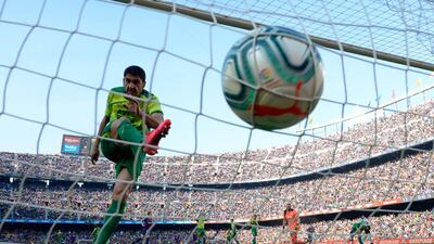 Eibar's Spanish defender Jose Angel reacts after Barcelona's Argentine forward Lionel Messi scored a third goa. AFP