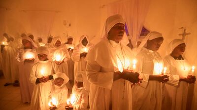 Christians attend the Christmas Eve vigil Mass at the Legio Maria African Mission in Nairobi, Kenya. Reuters