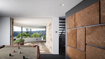 A pool table is among the playful elements in the River House’s lower-ground floor. Steve Back / Red Cover