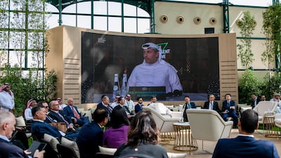 A screen broadcasts Khaldoon Al Mubarak, chief executive officer of Mubadala Investment Company, addressing the Future Investment Initiative in Riyadh. Bloomberg