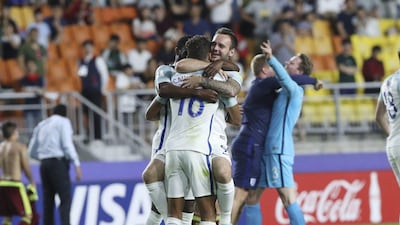 England's Dominic Calvert-Lewin, centre, Adam Armstrong, right, and Fikayo Tomori celebrate after defeating Venezuela during the final match of the Fifa Under-20 World Cup. AP Photo