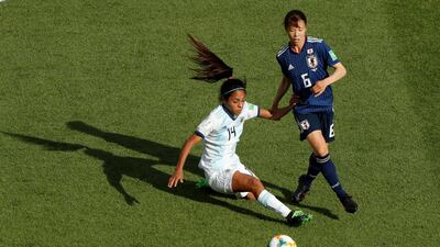 Argentina's Miriam Mayorga, left, in action against Japan's Hina Sugita. The Group D match ended 0-0. Reuters
