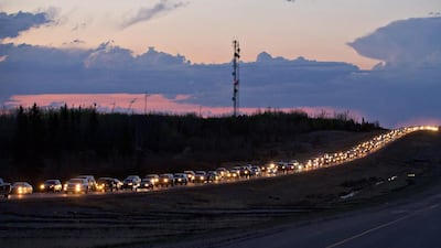 Traffic lines the highway as residents leave Fort McMurray, Alberta, Canada, on Tuesday May 3, 2016.. Jason Franson / The Canadian Press via AP
