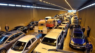 Vehicles are stranded inside a tunnel after a heavy downpour near Rafic Hariri International Airport at the southern entrance of Beirut. EPA