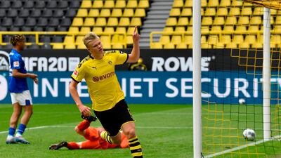 Burussia Dortmund forward Erling Braut Haaland celebrates after scoring the opening goal against Schalke at Signal Iduna Park on May 16. AFP