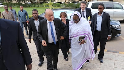 French Foreign Minister Jean-Yves Le Drian (C-L) and Sudanese Foreign Minister Asma Mohamed Abdalla (C-R) arrive for a meeting in Khartoum, Sudan. EPA