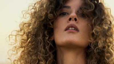 Dress, Dh11,073, Magda Butrym. Jacket, Dh2,865, Elisabetta Franchi